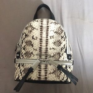 Michael Kors mini rhea backpack.